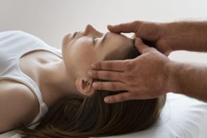 osteopathy-patoient-getting-tretment-massage-scaled
